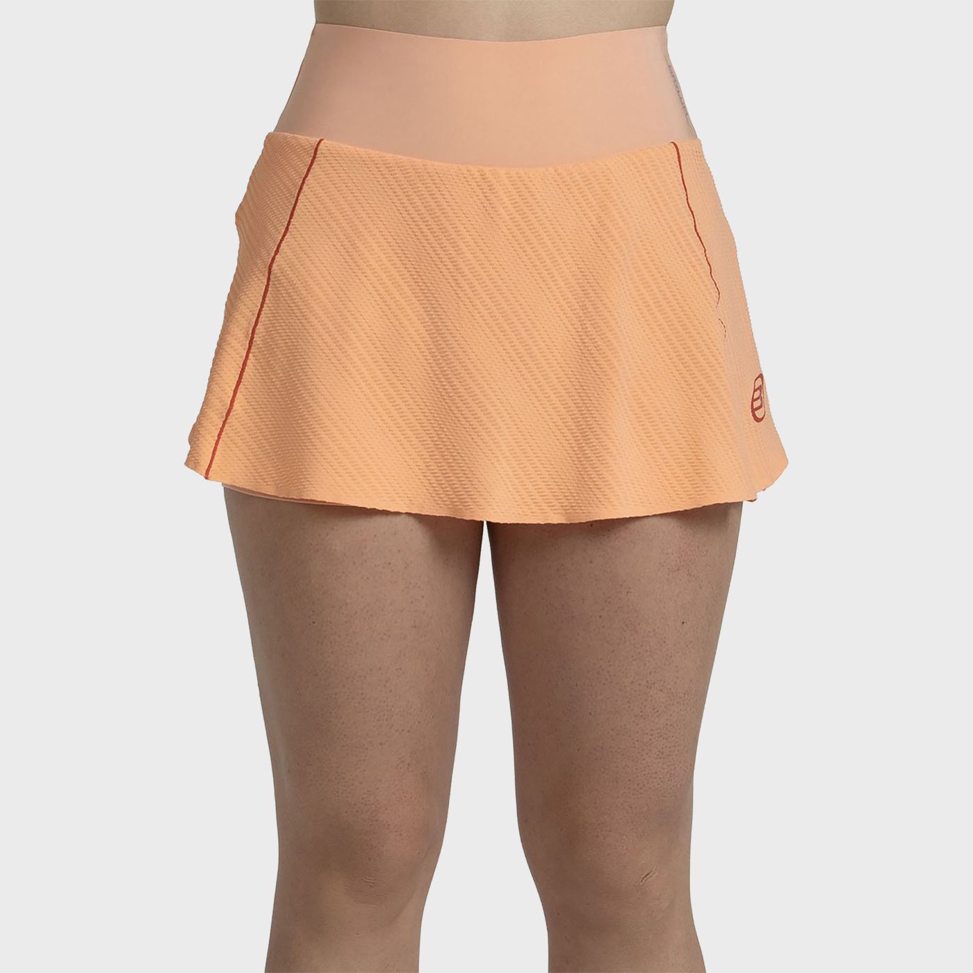 FALDA BULLPADEL ACIM NARANJA PASTEL